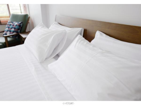 Chez Bure - Bure Homestay : photo 6 de la chambre suite deluxe avec lit king-size