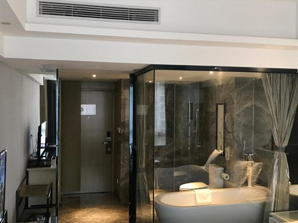 Paco Hotel Tianpingjia Metro Guangzhou - Canton Fair free shuttle bus : photo 3 de la chambre chambre lit king-size