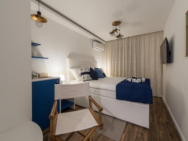 Blue Old Navy Rooms - AE1094 : photo 6 de la chambre chambre double