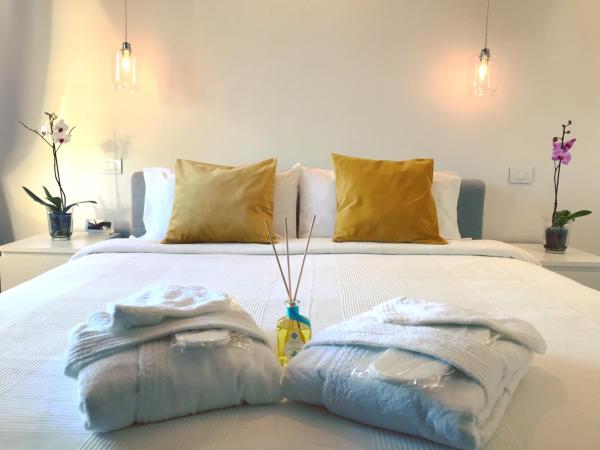 Villa Greta Hotel Rooms & Suites : photo 1 de la chambre suite junior avec balcon