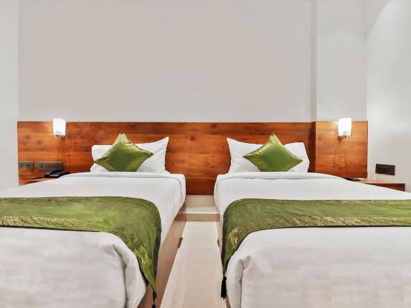 Treebo Blu Orchid : photo 7 de la chambre chambre double ou lits jumeaux standard [assainie]