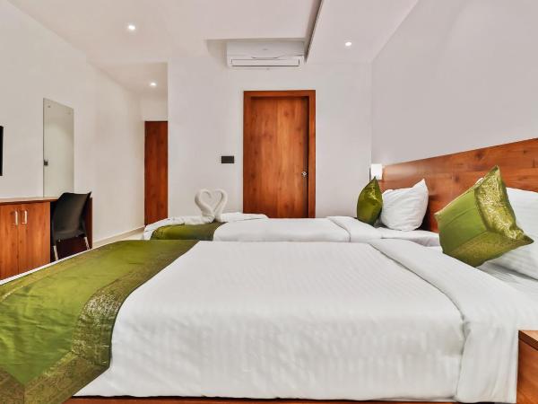 Treebo Blu Orchid : photo 10 de la chambre chambre double ou lits jumeaux standard [assainie]