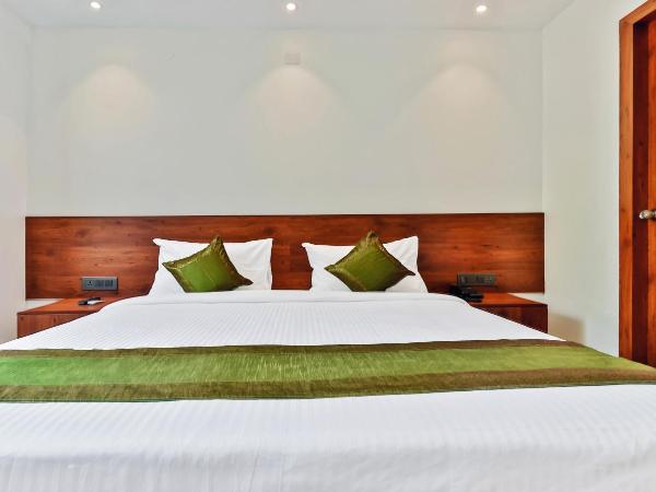 Treebo Blu Orchid : photo 4 de la chambre chambre double ou lits jumeaux standard [assainie]