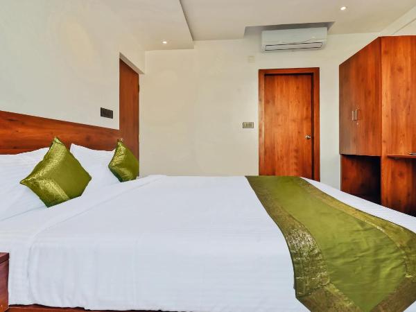 Treebo Blu Orchid : photo 7 de la chambre chambre double supérieure [assainie]