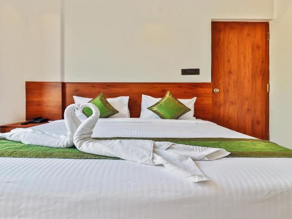 Treebo Blu Orchid : photo 3 de la chambre chambre double supérieure [assainie]