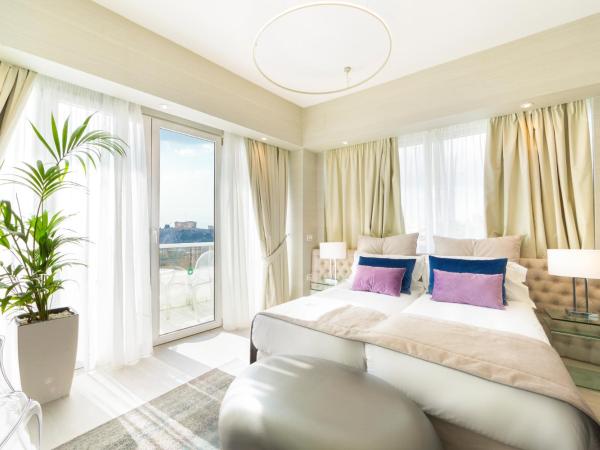 St George Lycabettus Lifestyle Hotel : photo 4 de la chambre suite deluxe avec balcon d'angle - vue panoramique sur l'acropole