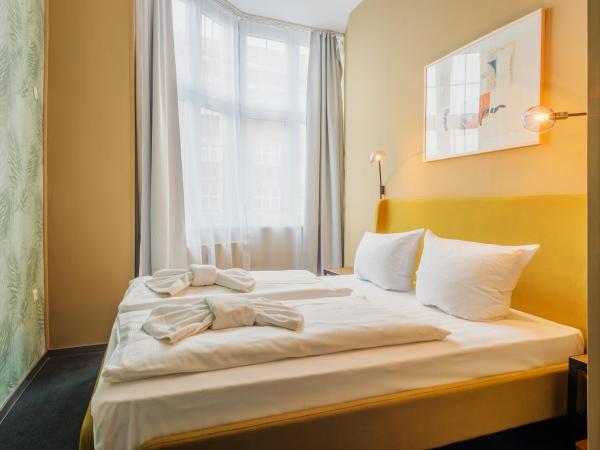 Hotel BELLEVUE am Kurfürstendamm : photo 9 de la chambre chambre double ou lits jumeaux