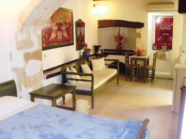 Madonna Studios : photo 5 de la chambre chambre double ou lits jumeaux deluxe – vue sur jardin