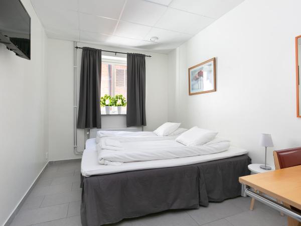 Kalmar Hotell : photo 6 de la chambre chambre lits jumeaux Économique avec salle de bains commune