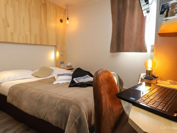 Hotel Restaurant Kyriad Brive Centre : photo 3 de la chambre hébergement 1 lit simple