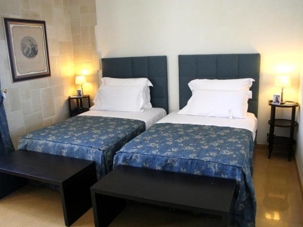 Domus Mariae Benessere : photo 3 de la chambre chambre double ou lits jumeaux