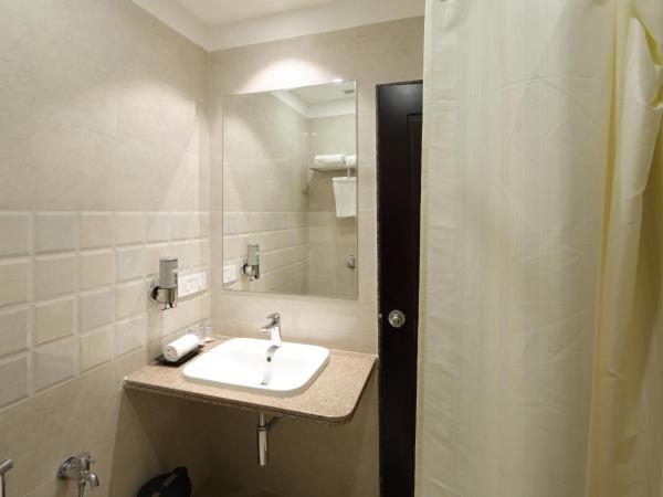 Regenta Inn Ranip Ahmedabad : photo 7 de la chambre chambre double ou lits jumeaux deluxe