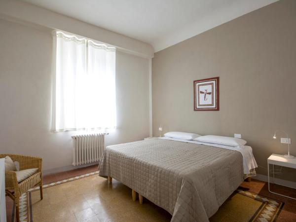 Piazza Paradiso Accommodation : photo 9 de la chambre appartement - vue sur jardin - bâtiment séparé