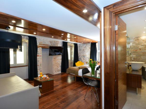 Jupiter Luxury Hotel : photo 2 de la chambre chambre quadruple deluxe