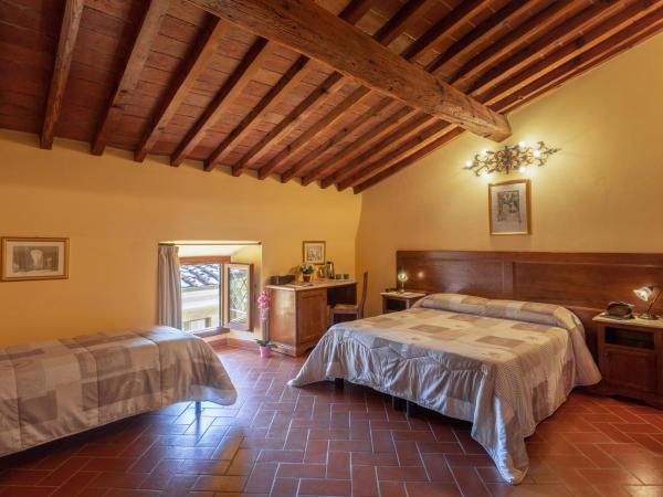 Palazzo Graziani : photo 2 de la chambre chambre triple