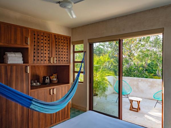 Hotel Tiki Tiki Tulum : photo 1 de la chambre suite lit king-size avec terrasse panoramique