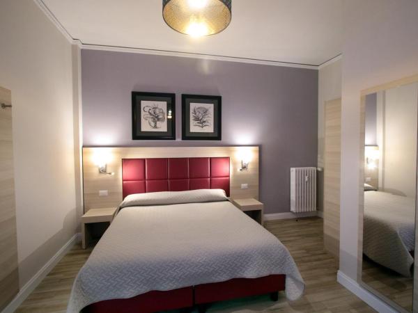 Alderotti Home : photo 6 de la chambre chambre lits jumeaux avec salle de bains privative