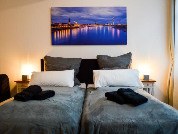 Centerapartments Tonhallenstraße : photo 2 de la chambre appartement t22