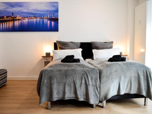 Centerapartments Tonhallenstraße : photo 1 de la chambre appartement t23