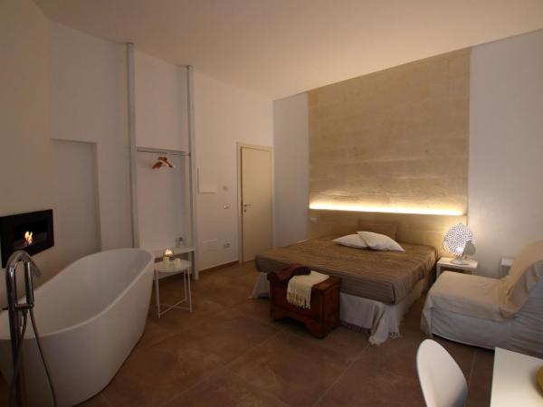 San Michele Luxury Rooms : photo 10 de la chambre suite junior