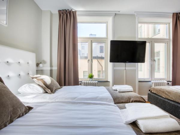 City Hotell Avenyn : photo 5 de la chambre chambre quadruple