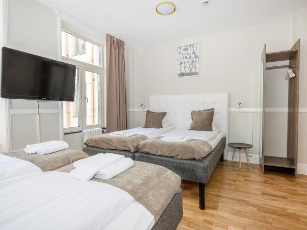 City Hotell Avenyn : photo 4 de la chambre chambre quadruple