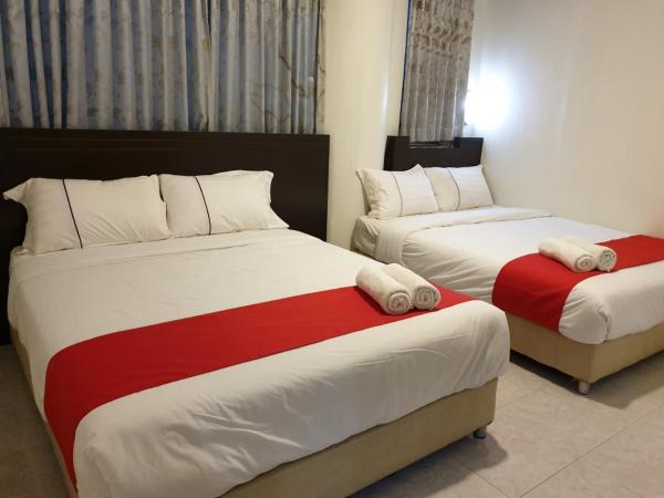 Fully Hotel Desa Tebrau : photo 2 de la chambre suite familiale