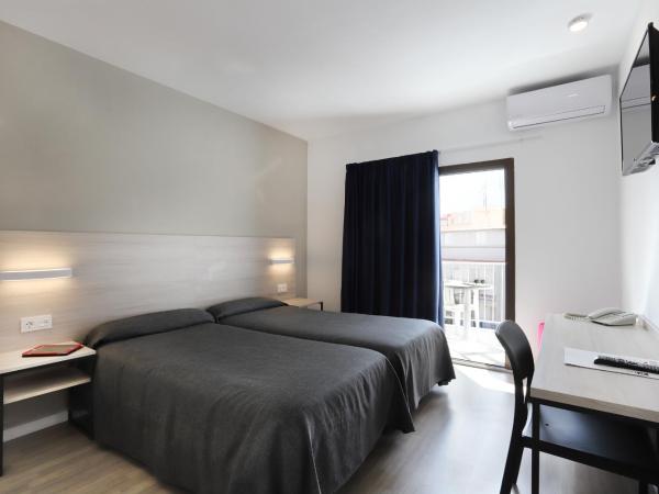 Hotel Brasil : photo 10 de la chambre chambre lits jumeaux