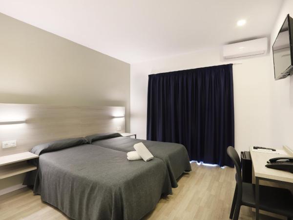 Hotel Brasil : photo 7 de la chambre chambre lits jumeaux
