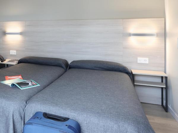 Hotel Brasil : photo 1 de la chambre chambre triple (3 adultes)