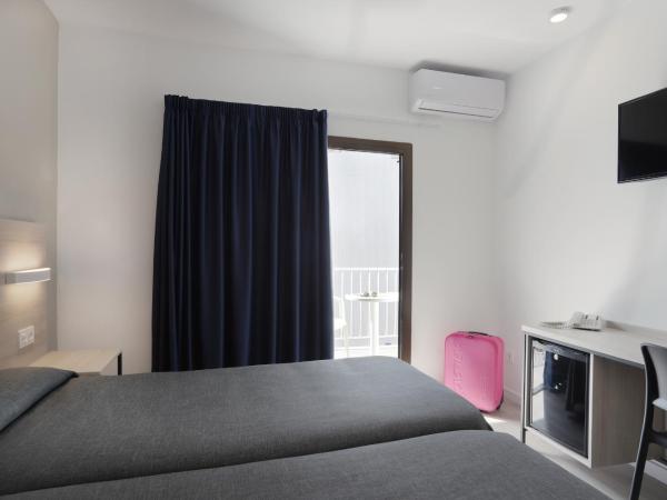 Hotel Brasil : photo 9 de la chambre chambre lits jumeaux