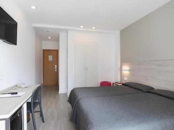 Hotel Brasil : photo 6 de la chambre chambre lits jumeaux - vue sur piscine