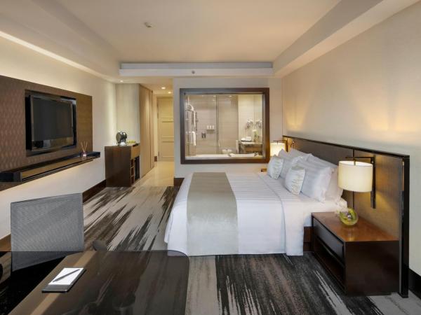 Gran Melia Jakarta : photo 2 de la chambre chambre niveau rouge avec accès au salon exécutif