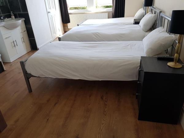 Boscombe Reef Hotel : photo 2 de la chambre chambre quadruple avec salle de bains privative - vue sur jardin