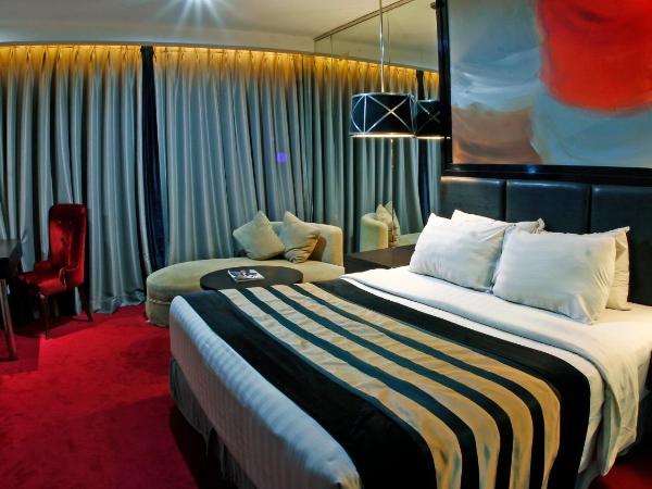 Amaroossa Cosmo Jakarta : photo 1 de la chambre chambre lit king-size deluxe