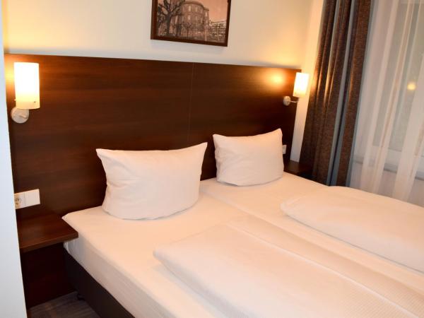 Trip Inn Budget Hotel Messe : photo 3 de la chambre chambre lits jumeaux standard