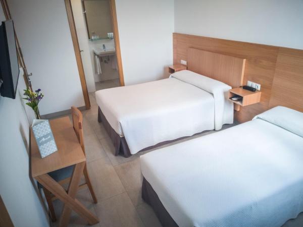 Hotel Abadi : photo 1 de la chambre chambre triple