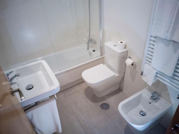 Hotel Abadi : photo 2 de la chambre chambre double ou lits jumeaux