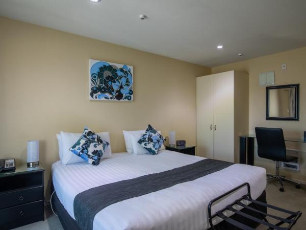 ASURE Abbella Lodge Motel : photo 2 de la chambre studio avec baignoire spa