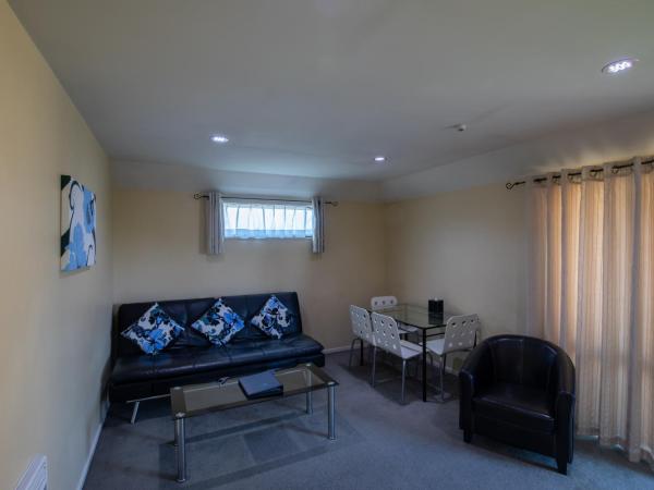 ASURE Abbella Lodge Motel : photo 1 de la chambre appartement 2 chambres avec baignoire spa