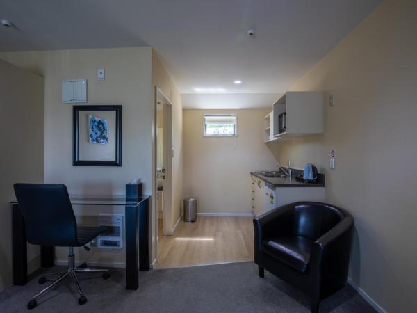 ASURE Abbella Lodge Motel : photo 4 de la chambre studio avec baignoire spa