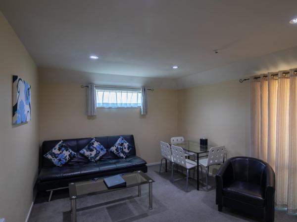 ASURE Abbella Lodge Motel : photo 9 de la chambre appartement 2 chambres avec baignoire spa