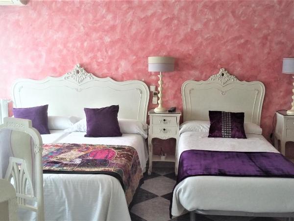 Hostal Goya Suites : photo 3 de la chambre chambre quadruple