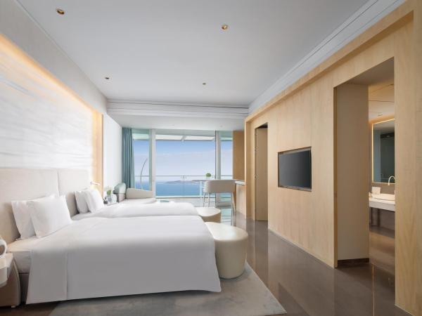 The Mangrovetree Sanya Resort : photo 3 de la chambre grande chambre lit king-size - vue à 180 degrés sur océan