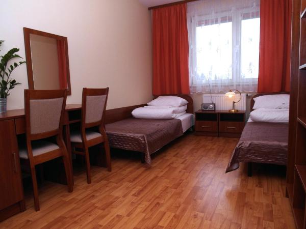 Ośrodek SCSK Optima : photo 1 de la chambre chambre lits jumeaux supérieure