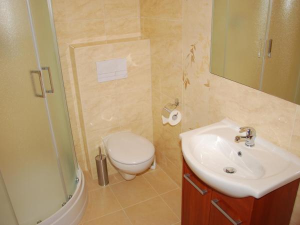 Ośrodek SCSK Optima : photo 2 de la chambre chambre lits jumeaux supérieure