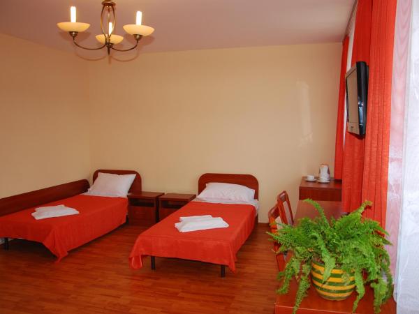 Ośrodek SCSK Optima : photo 4 de la chambre chambre quadruple supérieure