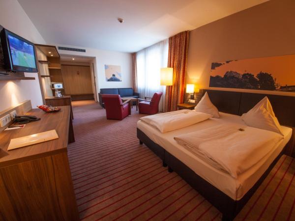 Novina Hotel Tillypark : photo 1 de la chambre chambre triple