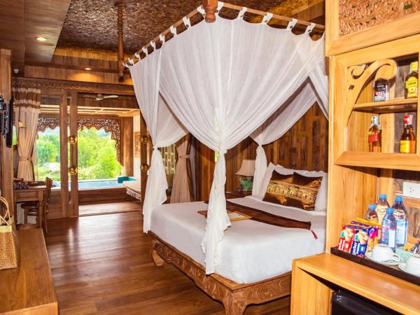 Santhiya Tree Koh Chang Resort : photo 2 de la chambre grande suite avec piscine - vue sur eau