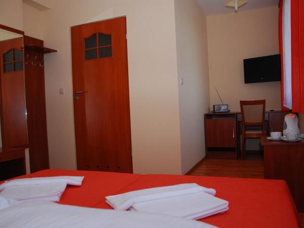 Ośrodek SCSK Optima : photo 3 de la chambre chambre double supérieure (1 adulte)